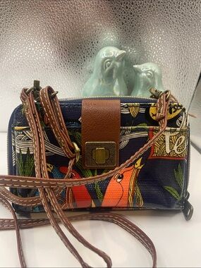Sakroots Navy Crossbody Wallet with Multicolor Parrot Print and Brown Trim
